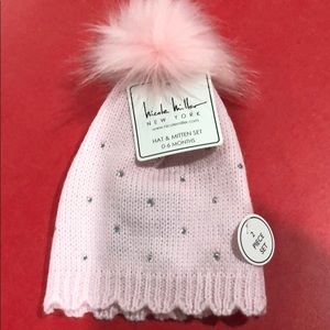 Pink infant hat with mittens.